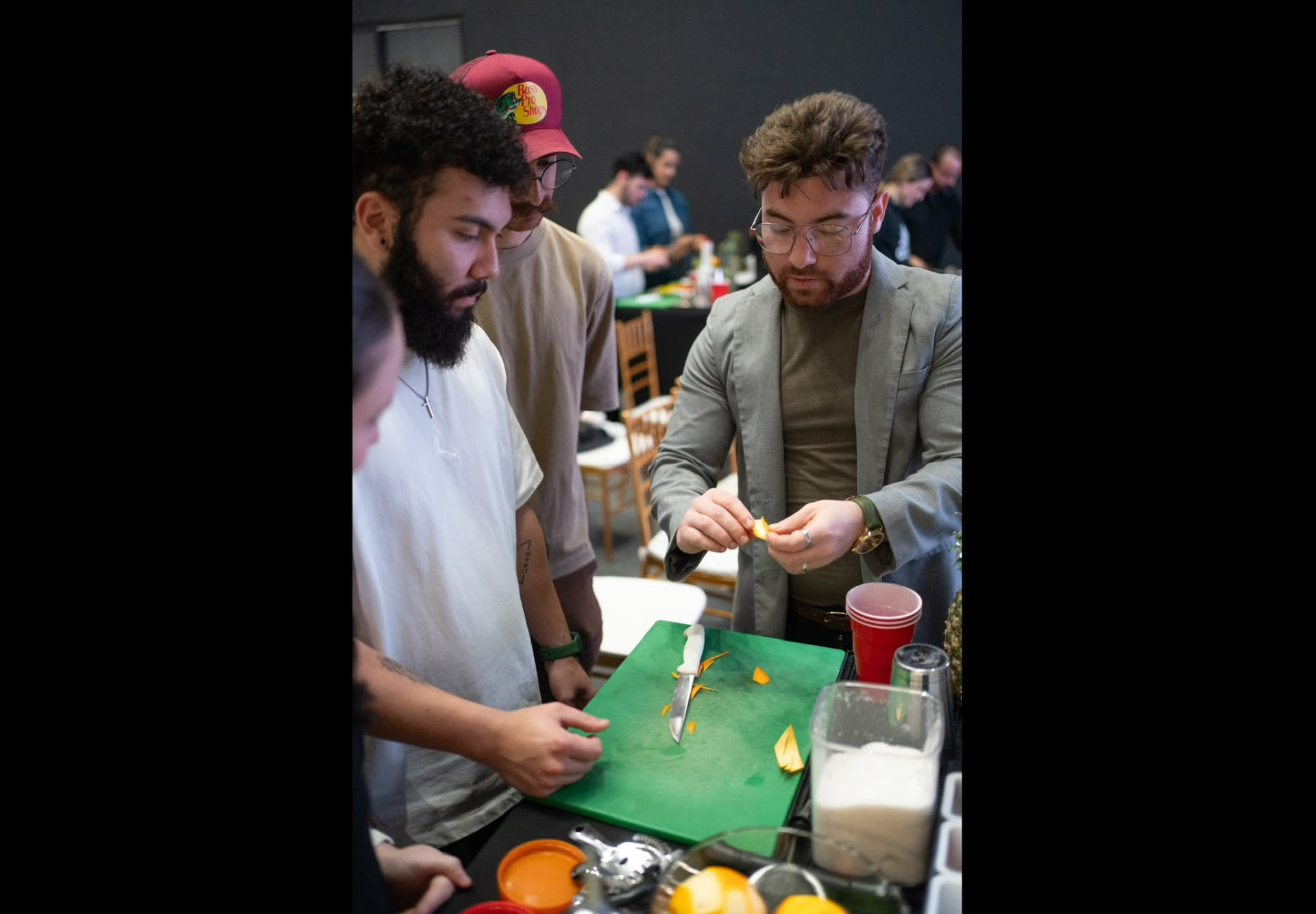 Pedro Pacheco demonstrating garnish technique to students during the training